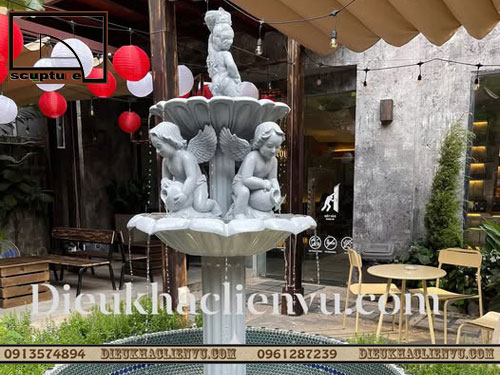 Đài nước cậu bé đổ nước