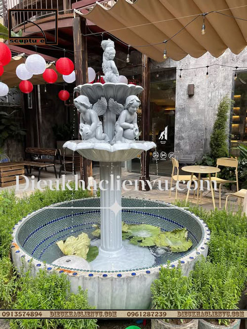 Đài nước cậu bé đổ nước